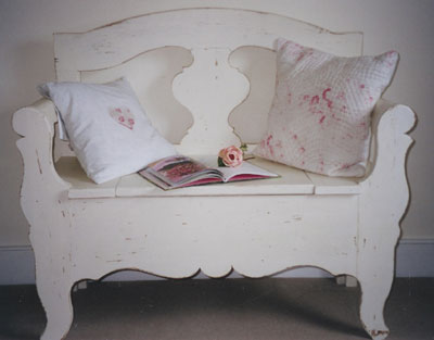 Distressed painted loveseat